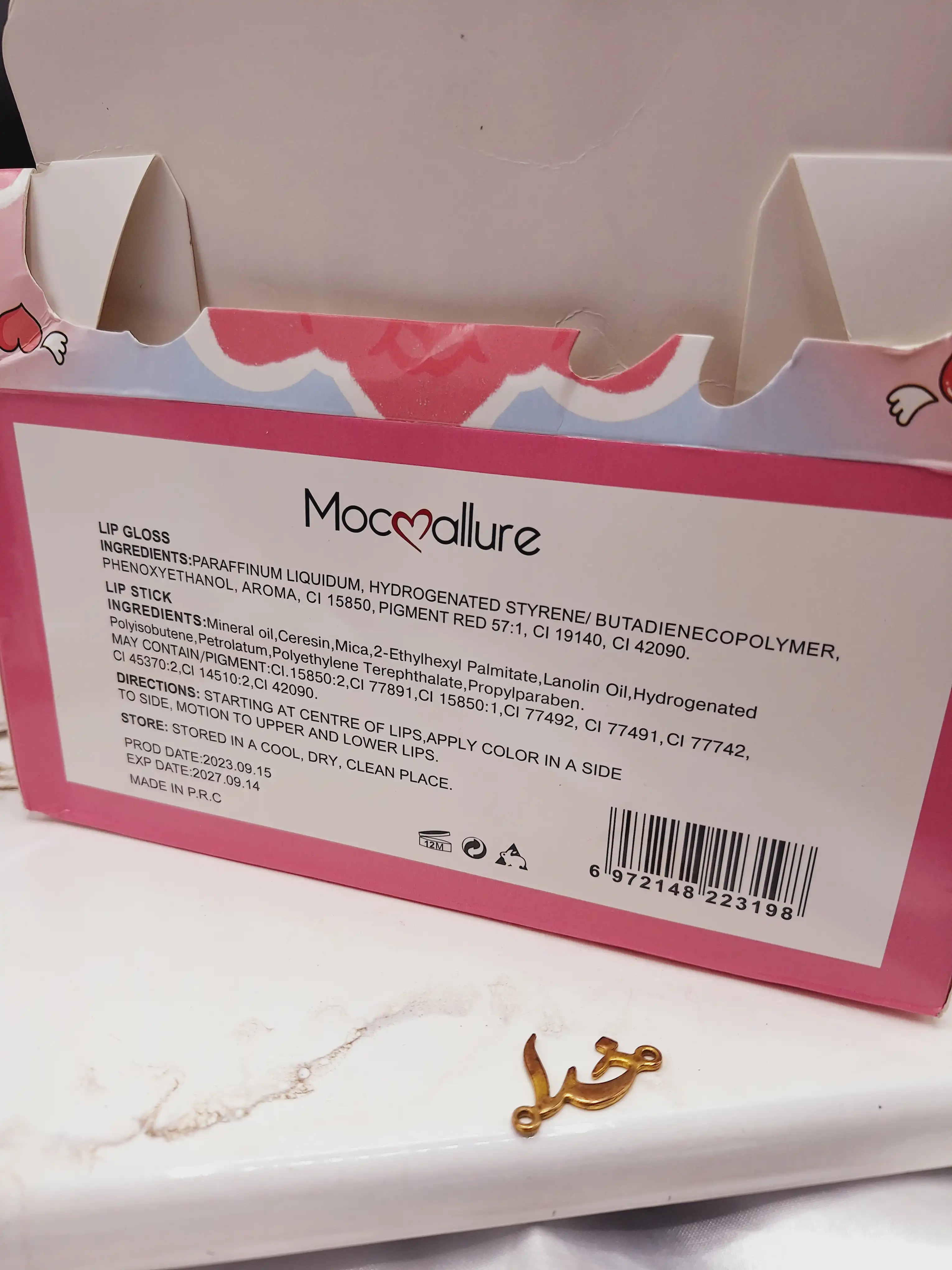 لیپ گلاس و بالم لب همراه با کش مو فانتزی موکالره Mocallure کد Moc 319