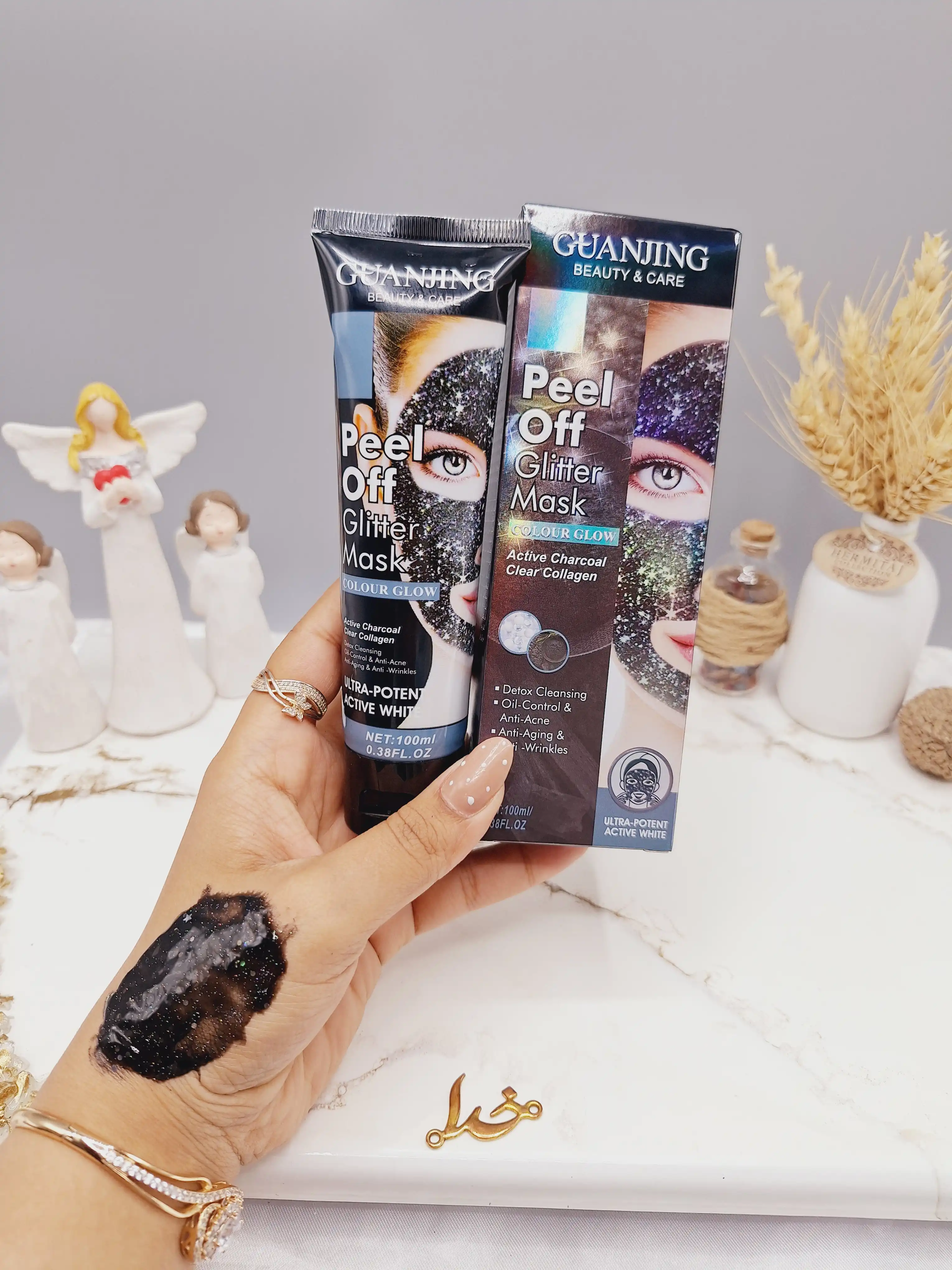 ماسک تیوپی لایه بردار پیل آف گلیتری با عصاره زغال فعال  GUANJING کد GJ7095