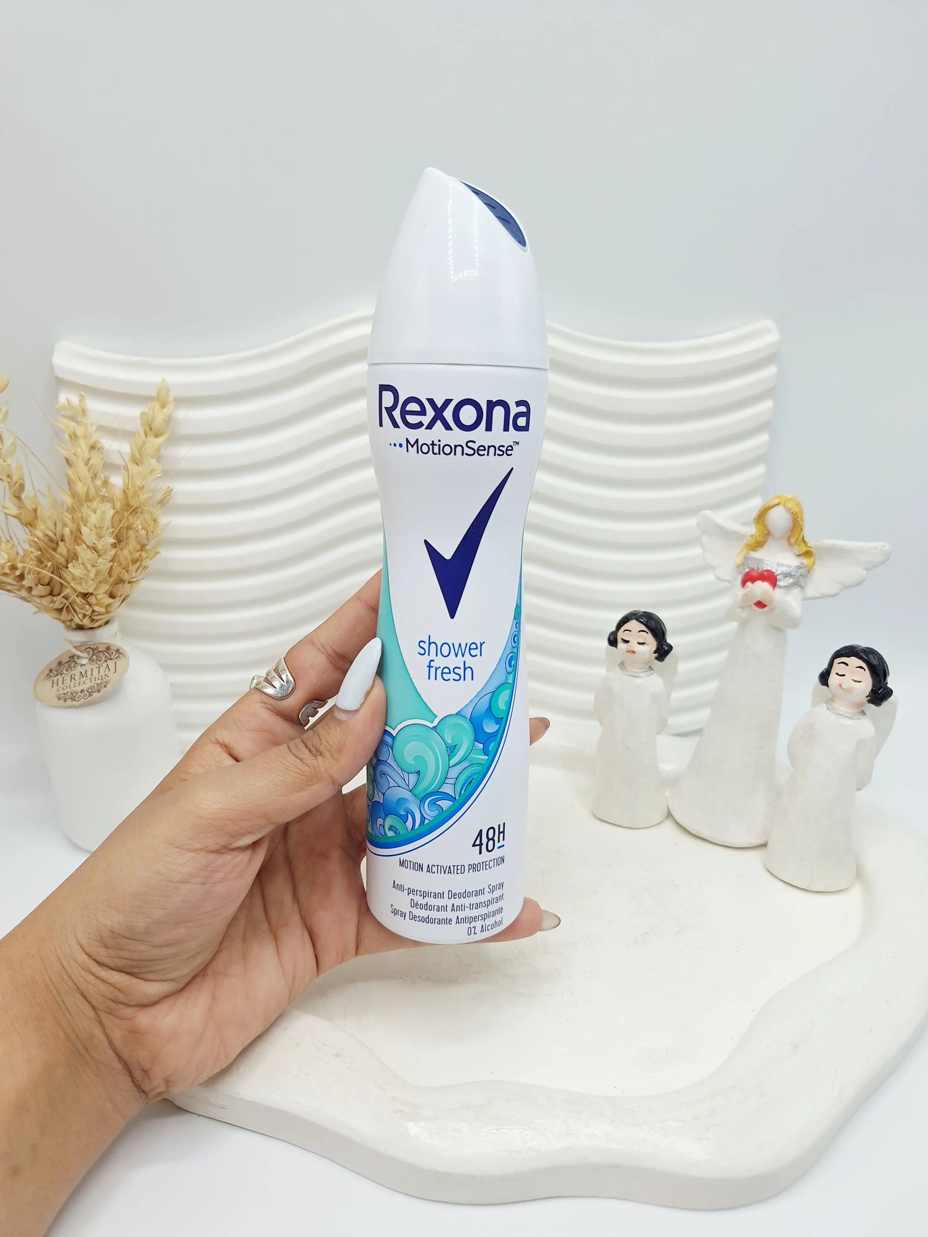 اسپری رکسونا زنانه مدل Pure نامرئی با تکنولوژی MotionSense محافظت 48 ساعته کد ۹۷۳۳