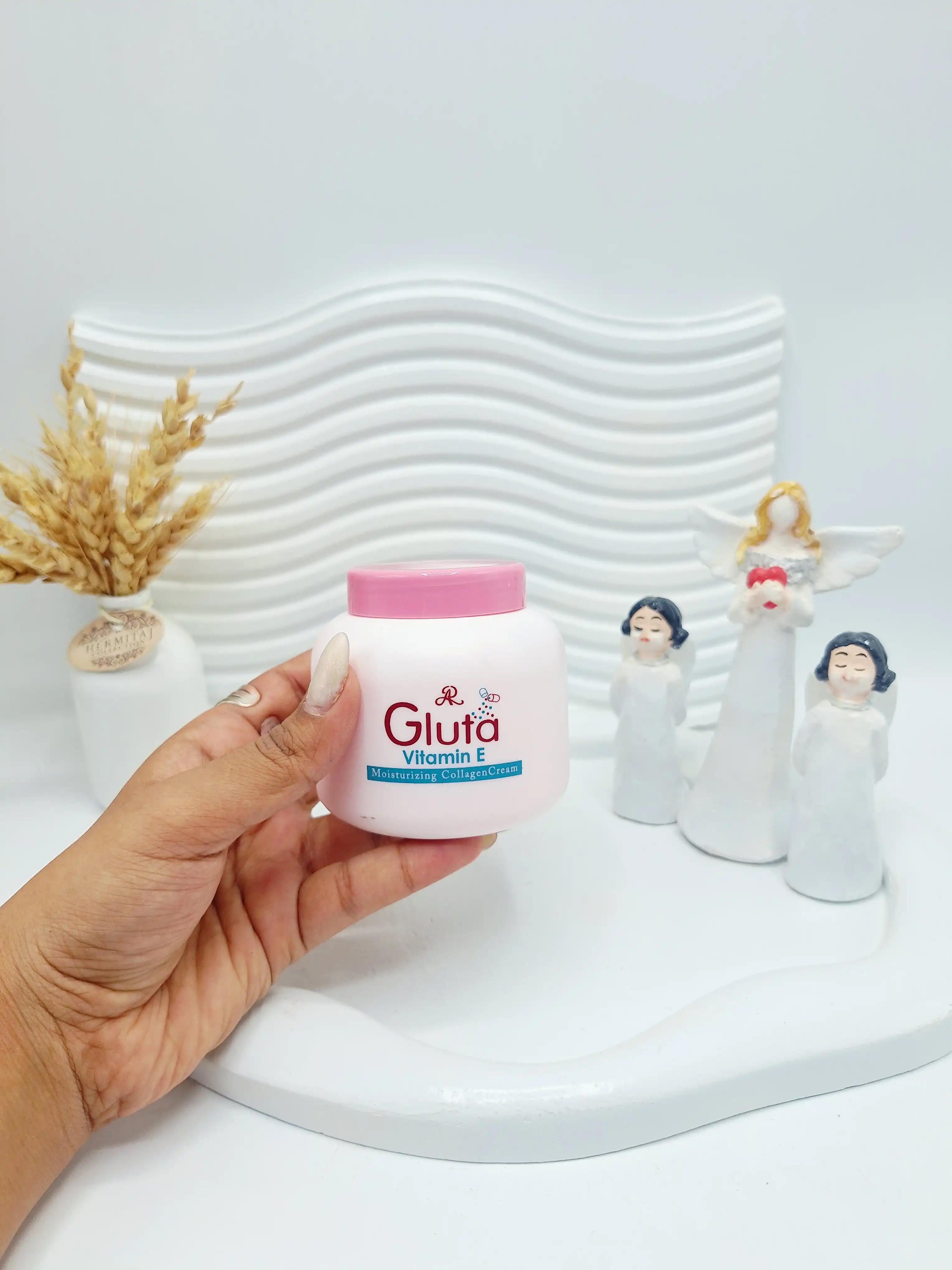 کرم مرطوب کننده کلاژن ویتامین E برند Gluta کد 5665