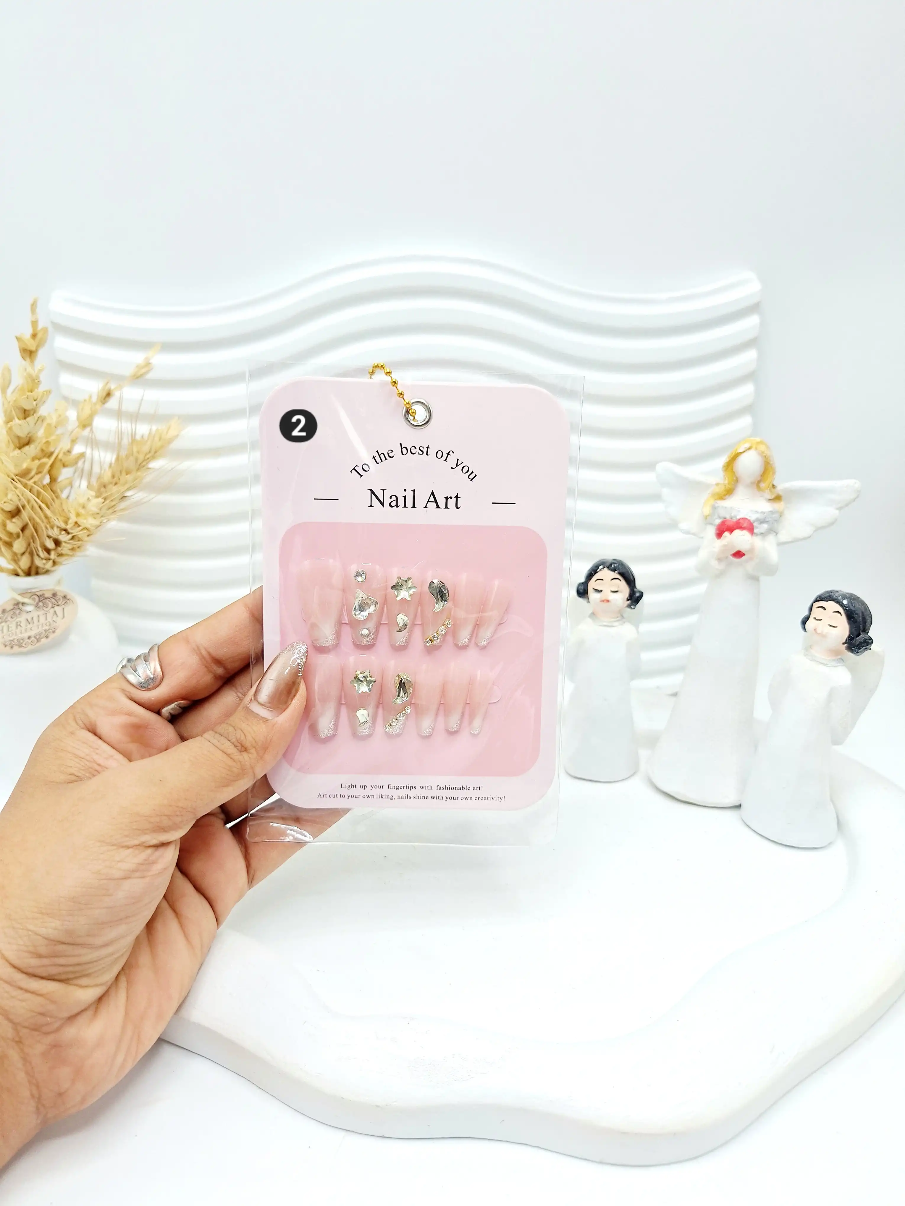 پک ناخن مصنوعی اشرافی در بسته بندی شیک به همراه چسب دو طرفه شفاف